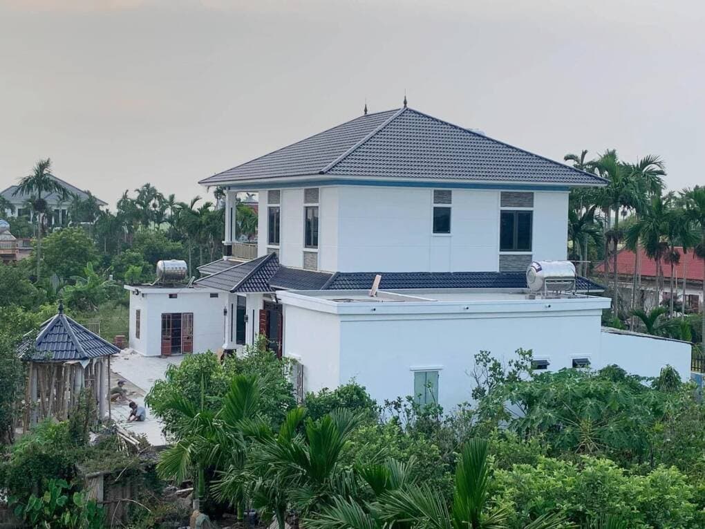 Vợ chồng buôn rau từ bỏ giấc mơ nhà phố, về quê xây biệt thự cho cha mẹ